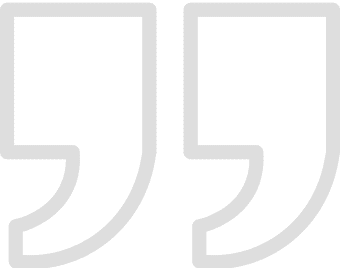 Double quotation marks on a black background.